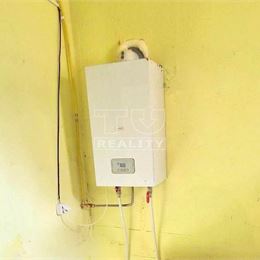 Zníženie ceny !! Na predaj skvelý domček /200 m2/ na dobrej adrese po čiastočnej rekonštrukcii v meste